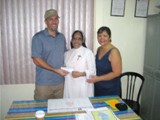 Fiore School in the Philippines - Steve Heintz and Ayo Reyes present donation to Sister Annie