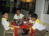 Fiore School in the Philippines - Several students from Fiore school enjoy lunch